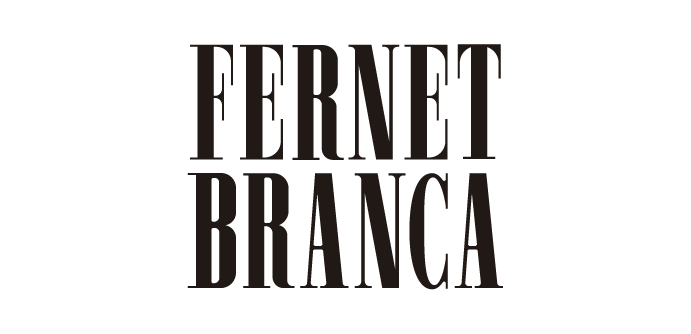 Black and white portrait of a dance instructor against a light background.