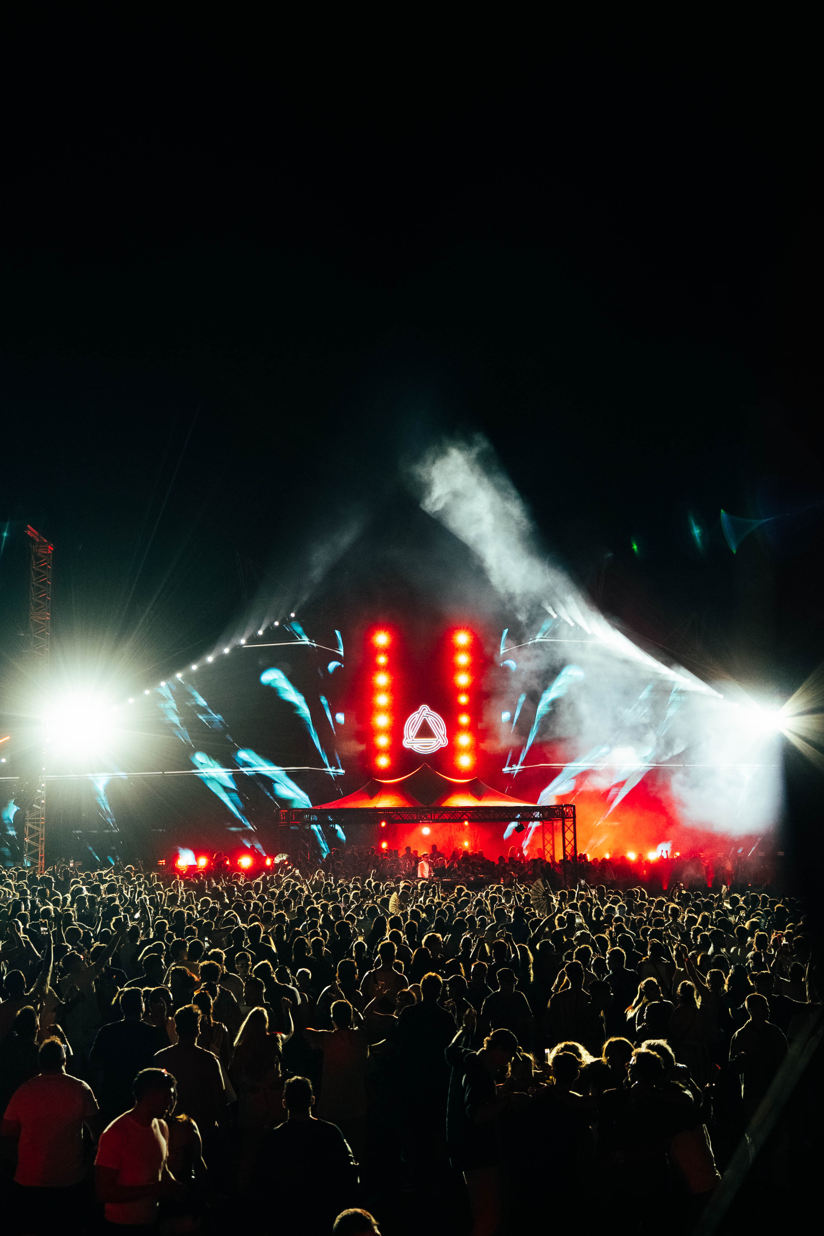 Black and white portrait of a dance instructor against a light background.