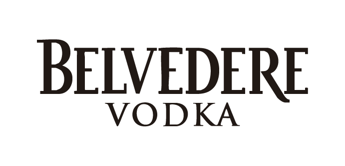 Black and white portrait of a dance instructor against a light background.